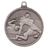 silver football medal in a classic High Relief style