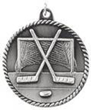 silver hockey medal in a classic High Relief style