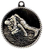 gold wrestling medal in a classic High Relief style