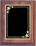 cherry woodgrain plaque with black starburst decorative plate
